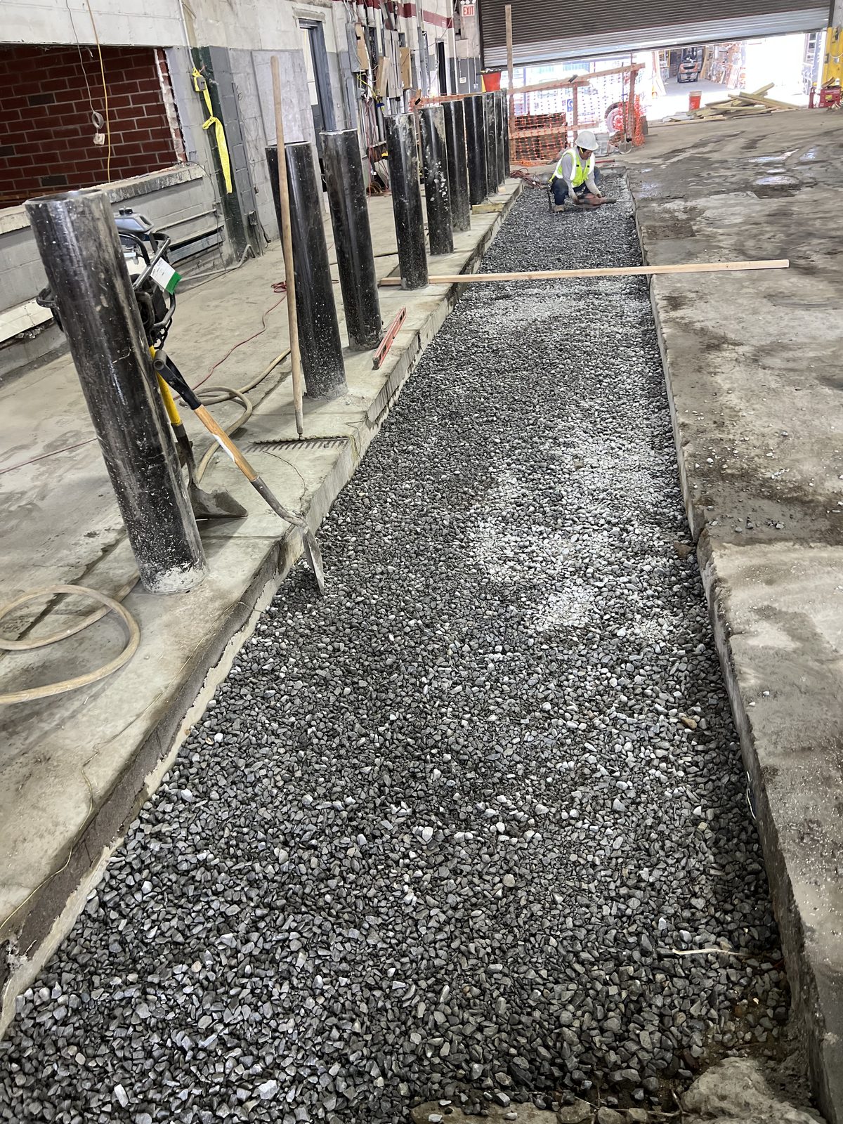 JBS commercial concrete subgrade prep with gravel base ready for pour