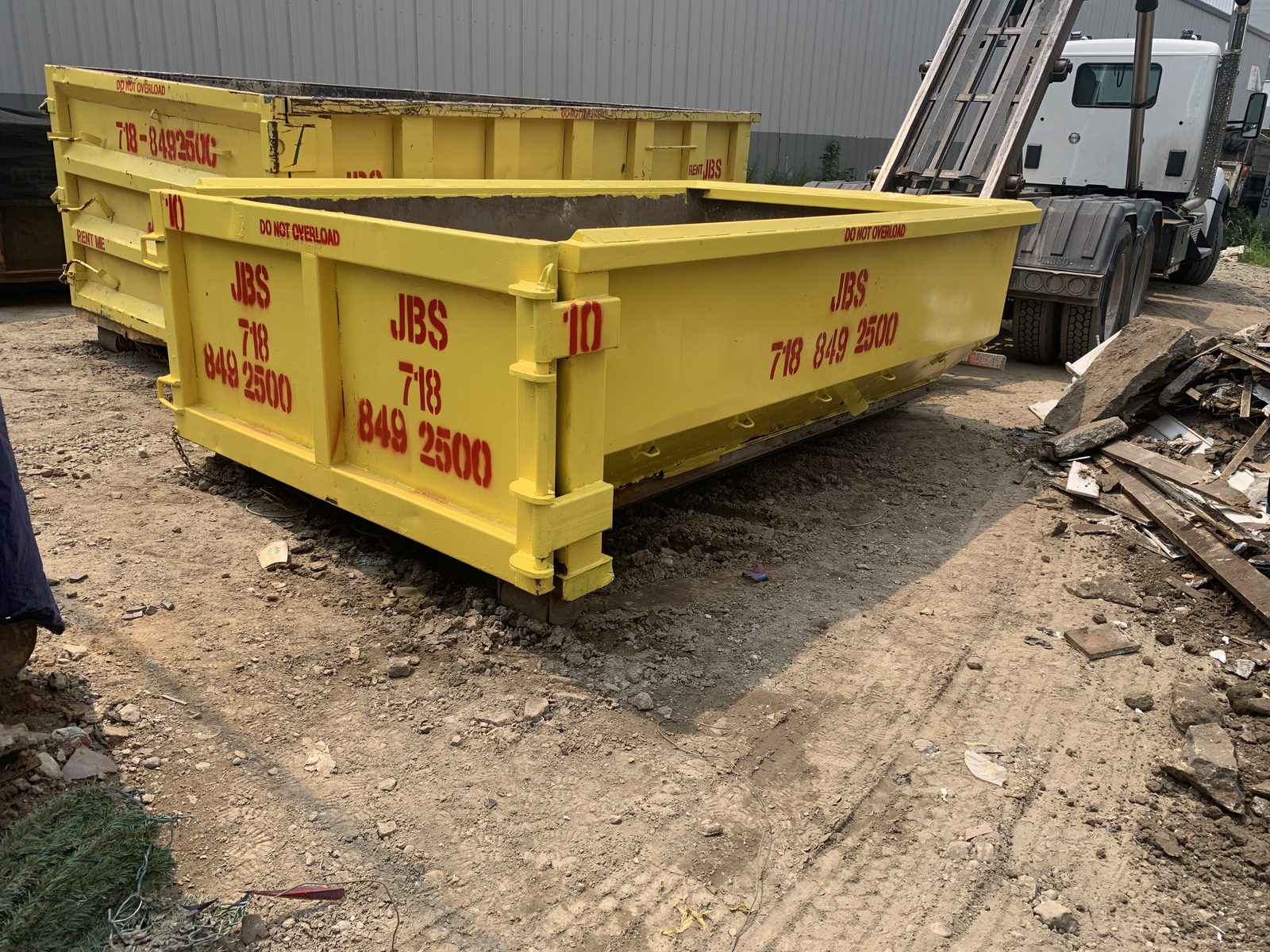 JBS 10 yard dumpsters at fleet yard ready for same-day delivery